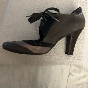 Jeffrey Campbell lace up wing-tip heels.
